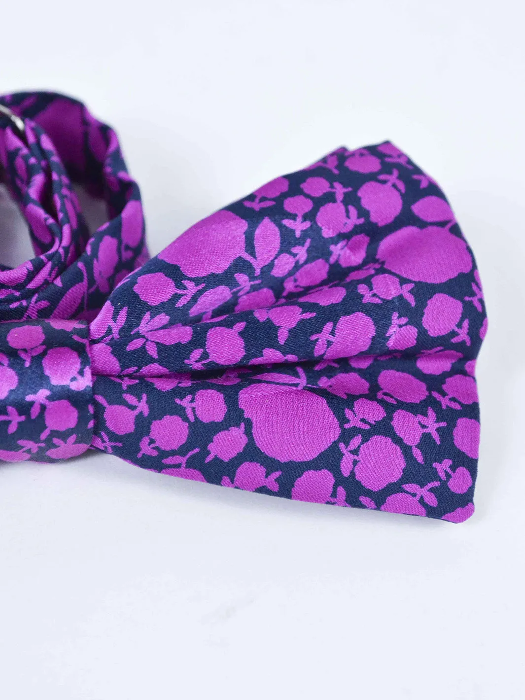 1980s silk bow tie with violet flowery print on black background