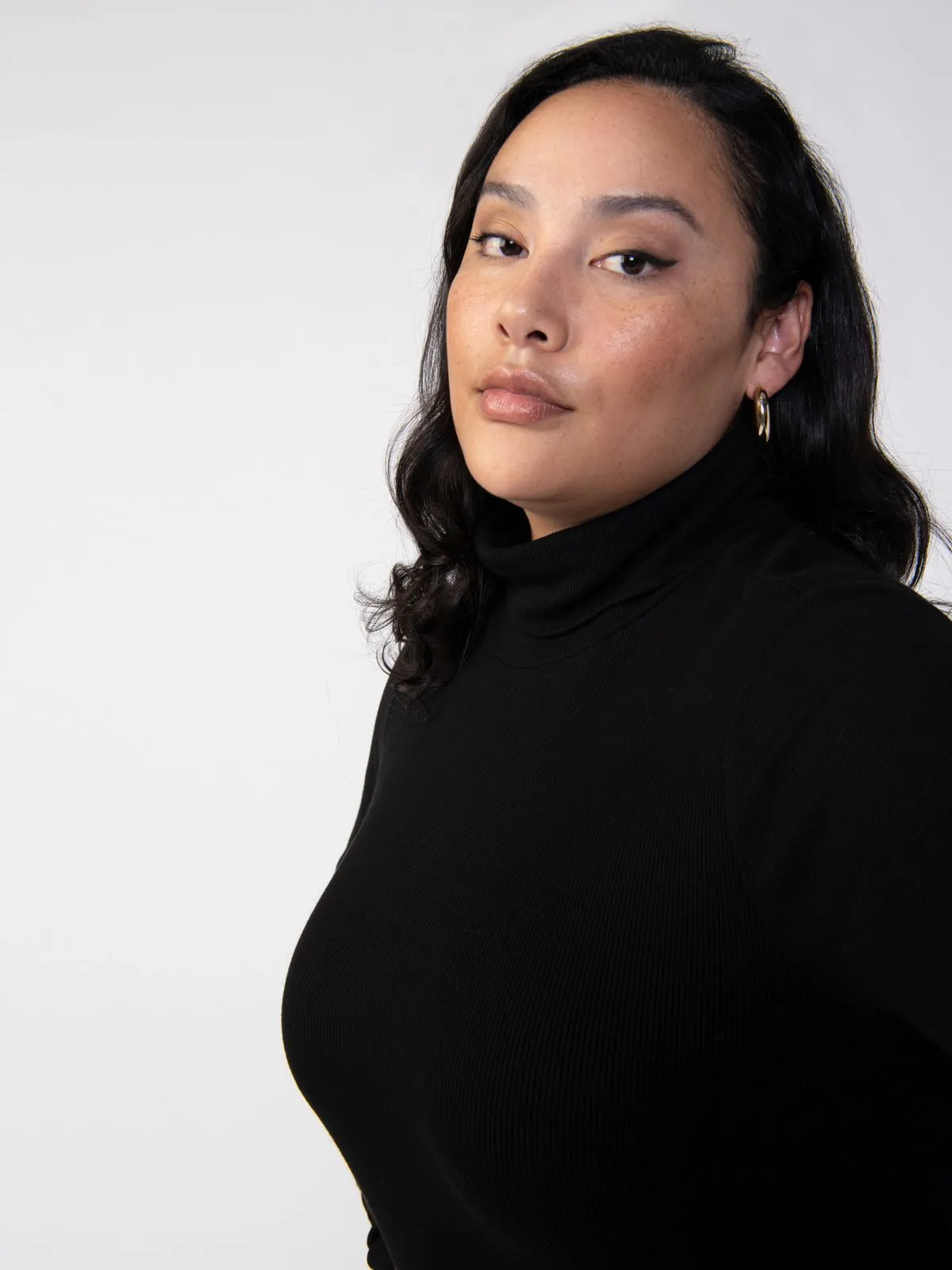 Essential Turtleneck Top Black Inclusive Collection